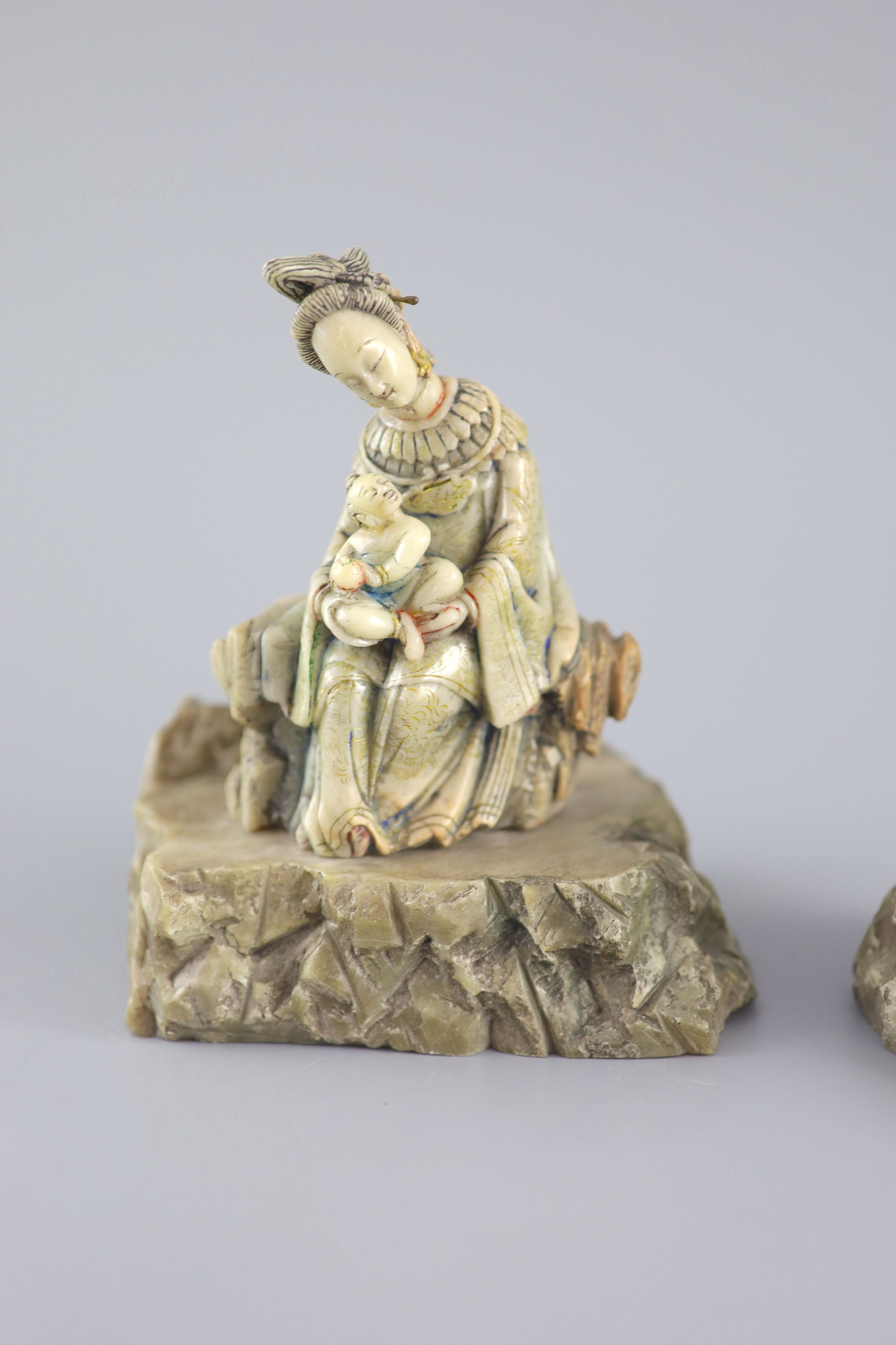A Chinese soapstone group of Guanyin and child, probably Kangxi period, 15 cm high